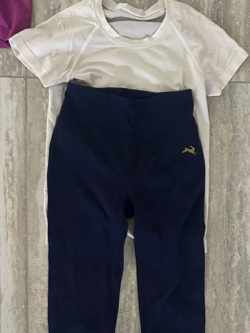 Lululemon running top and Tracksmith leggings